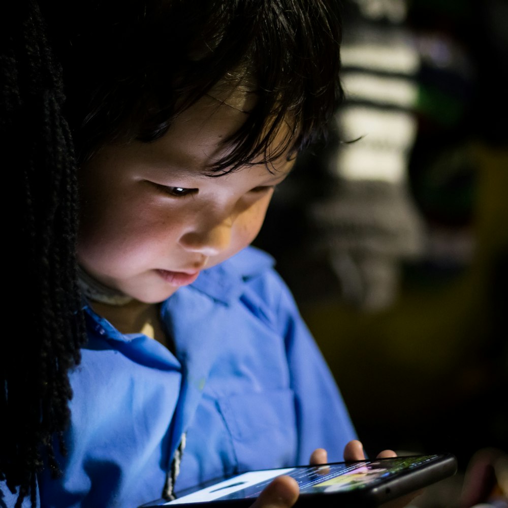 Representative photo of a child using a tablet