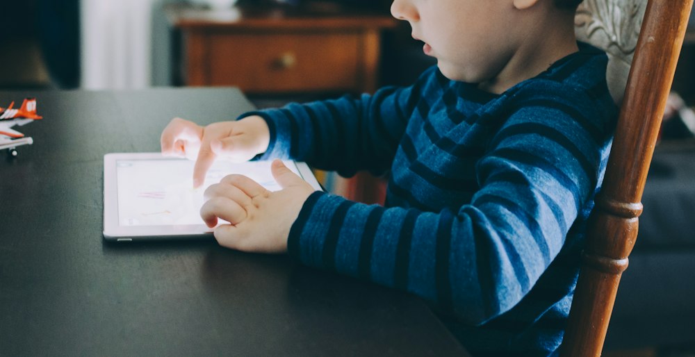 Representative photo of a child using a tablet